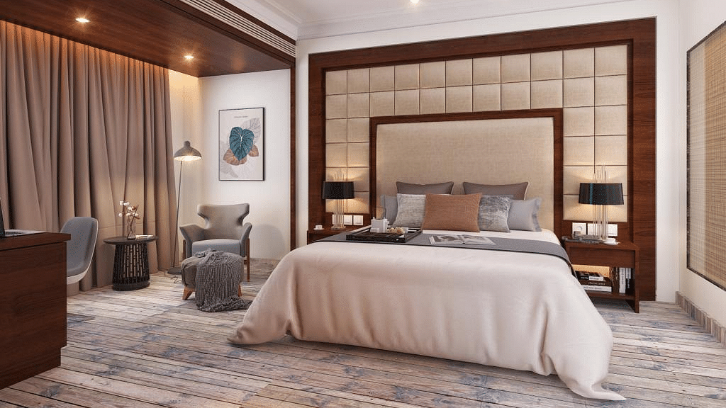 Suite with a king size bed and lamps on each side of the bed at BluSalzz Residence, Amritsar.